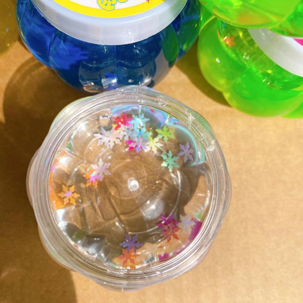 Juguete de barro de cristal colorido al por mayor de calabaza pegamento espumante delgado hecho a mano 2 yuanes grandes almacenes de alta transparente de color barro