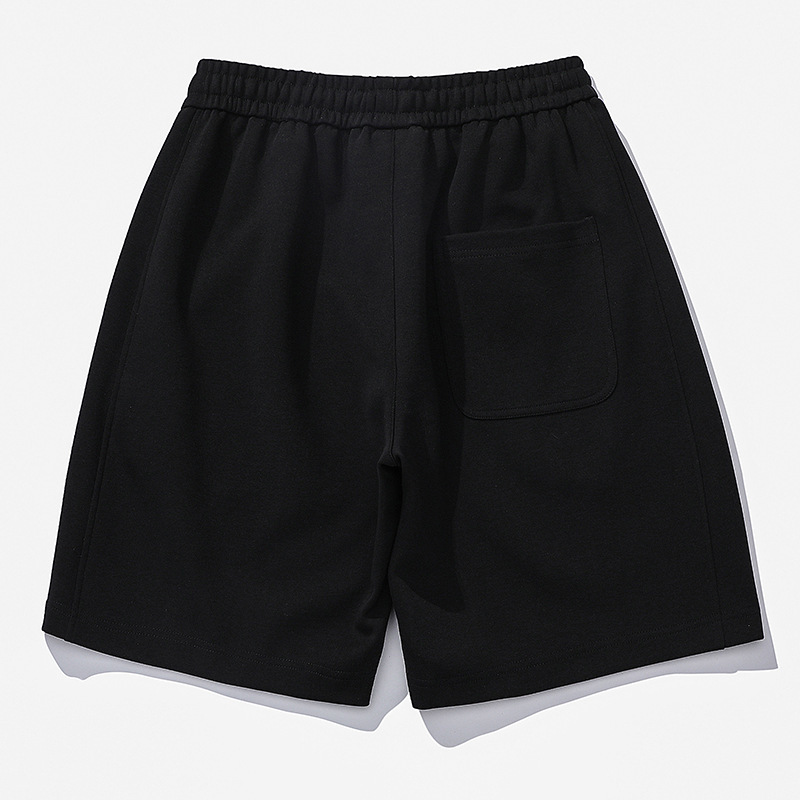 Nuevas tendencias pantalones cortos de cinco puntos de color sólido de verano versión coreana de pantalones deportivos casuales para hombres