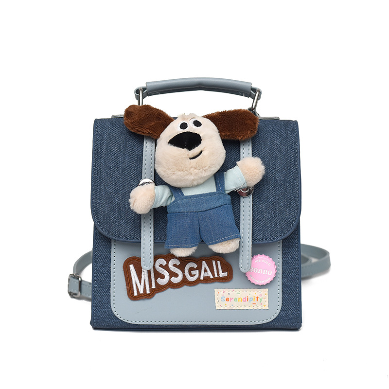 2026 nueva muñeca mochila de dibujos animados mujer textura mochila portátil nicho de viaje diario lindo bolso pequeño