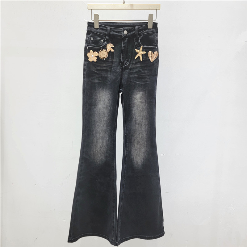 Alta sensación tridimensional decoración micropantalones jeans para mujeres 2026 primavera nuevos pantalones jeans elásticos delgados