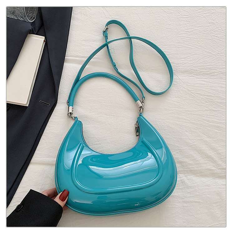 Bolso de luna nueva portátil de alta calidad bolso de mujer 2025 transfronterizo sudeste asiático nuevo estilo color gelatina bolso de mensajero de lujo ligero