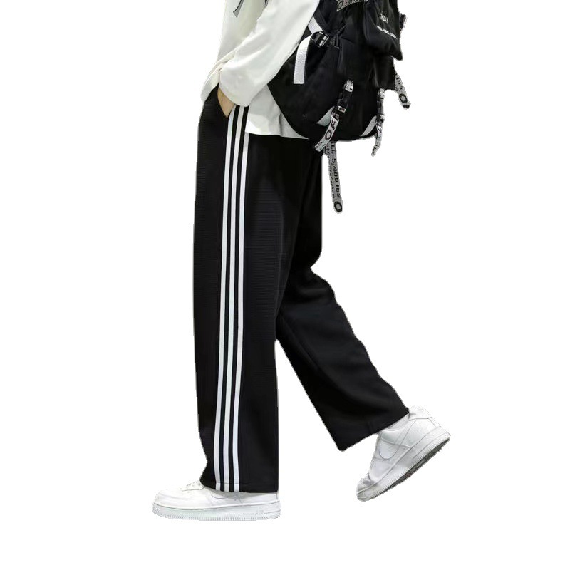 Primavera y otoño tres barras pantalones casuales deportes de los hombres pantalones de chándal recortados de moda marca niños verano Pantalones largos rectos
