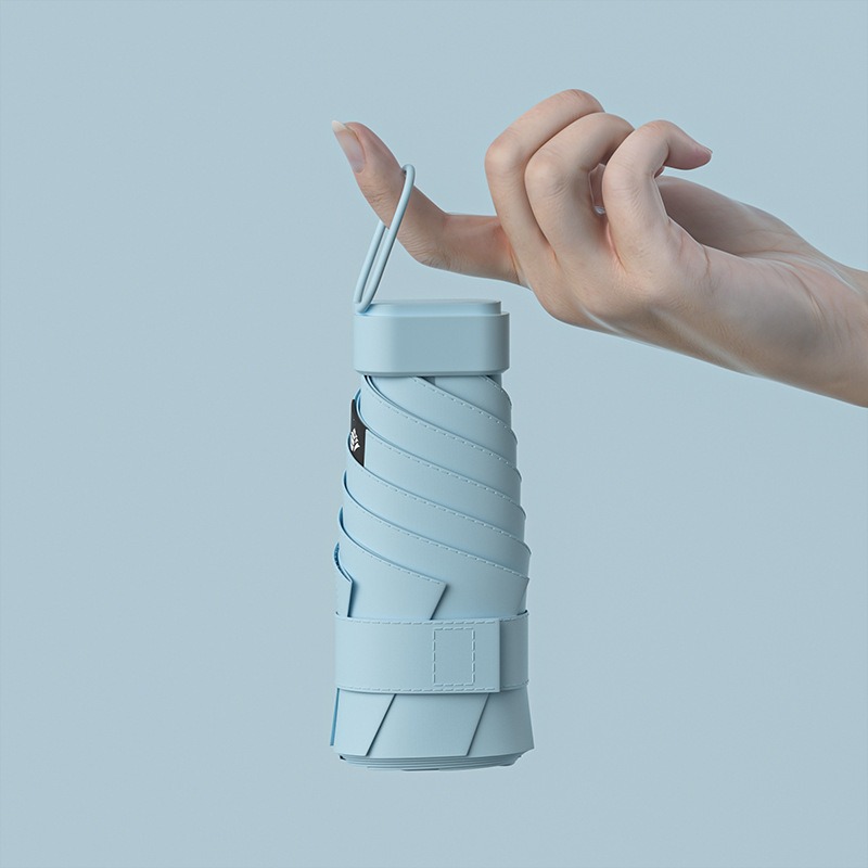 Paraguas de protección solar de vinilo creativo mini paraguas de seis pliegues paraguas de cápsula de bolsillo pequeño para mujer lluvia y lluvia paraguas de sol de doble uso