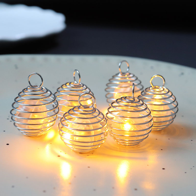 Glowing spring pendant hollow rocker ball firefly diy keychain earrings mobile phone chain pendant material