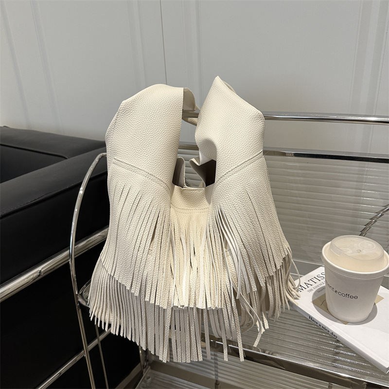 Bolsa coreana de bordas 2025, nueva moda de gran capacidad retro bolso de viaje relajado bolso axilar