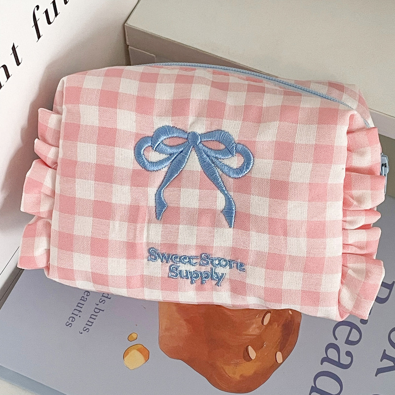 格子縞の蝶結びの小銭入れは学生の甘い格子のハスの葉の辺の旅行の携帯の刺繍の洗面の包みを収納します。|undefined