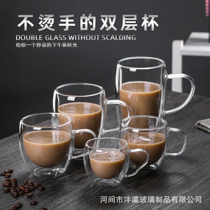 Taza de vidrio de doble capa de aislamiento térmico Taza de agua de vidrio transparente de leche con asa doméstica Taza de café de oreja plana fabricante al por mayor