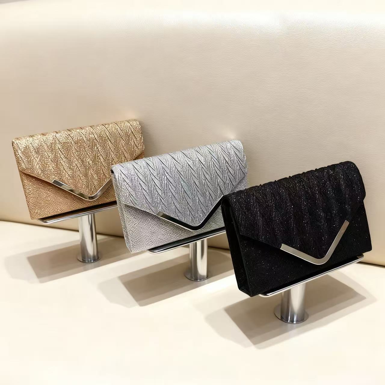 Cross-border nueva bolsa de cena de damas lujosa esquinilla pliegue de alta sensación bolsas de mano bolsa de fiesta de moda bolsa de cena