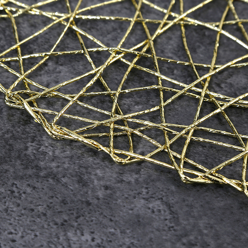 Creatividad transfronteriza hueco tejido almohadilla aislante de dorado alambre entrelazado almohadilla de mesa de comedor occidental almohadilla de mesa