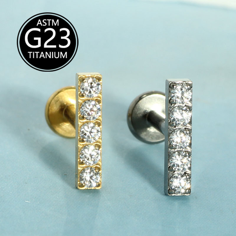 Silver pointed spike labret stud material detail