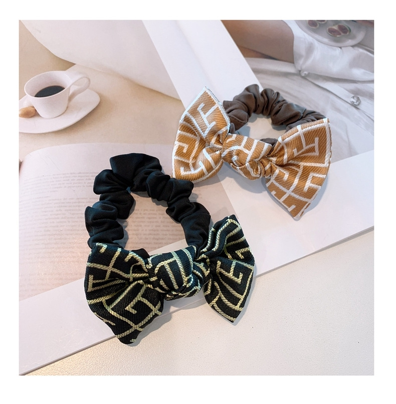 Korea Retro Printed Cute Little Bowknot Hair Scrunchies display picture 11