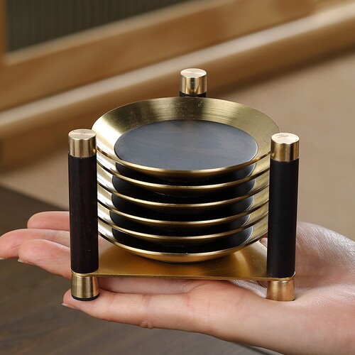High-end copper, wood, ebony, and rosewood solid wood tea coaster—elegant, minimalist, and newly designed in the Chinese style, featuring heat-resistant functionality.