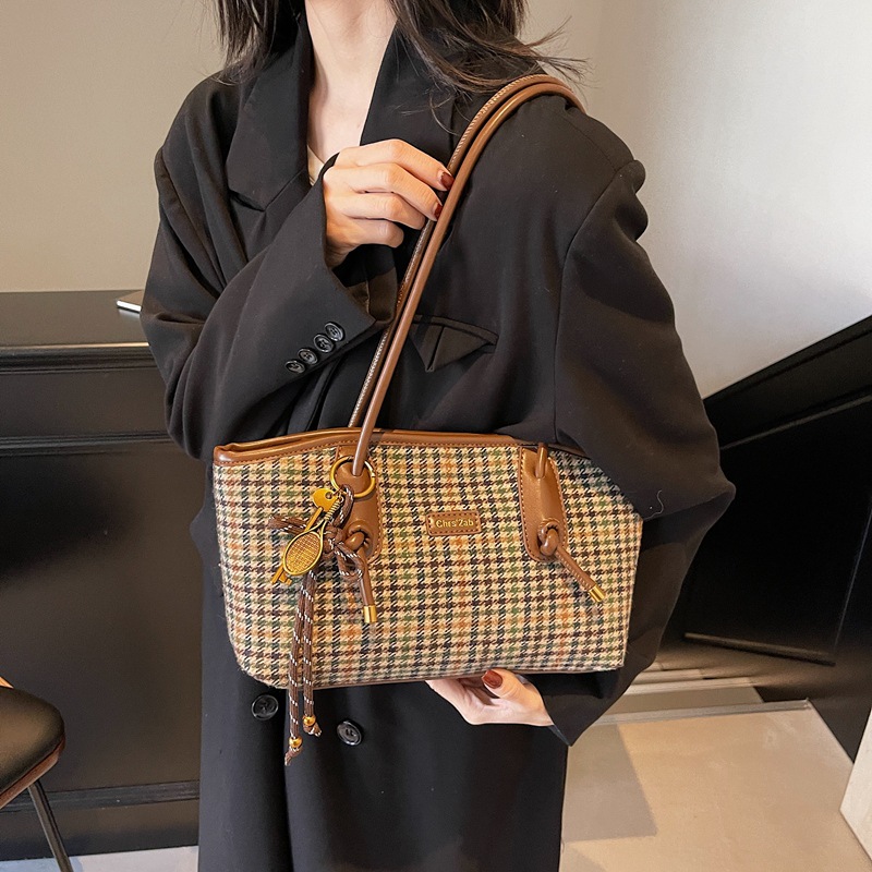 Coreano 1000 pájaros estilo extranjero hombro brazo bolso de viaje de gran capacidad para mujeres 2025 nuevo bolso de moda