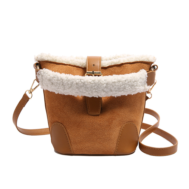 Coreano nicho bolso de cubo de mano mujer 2025 primavera nueva moda retro bolso de hombro bolso de peluche empalmado mochila