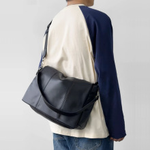 黑色pu邮差包男士斜挎单肩包男情侣纯色简约韩国休闲背包