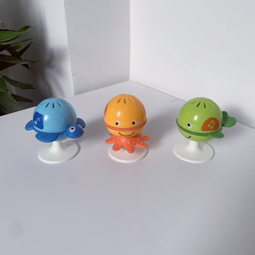 Baby dining chair stroller suction cup rattle 0-1 year old baby marine animal hand rattle three-piece set of soothing toys