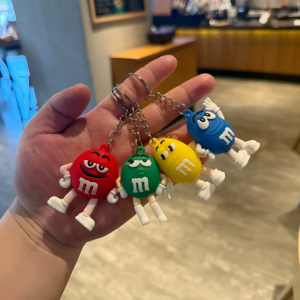 New Trendy M&M Keychain Doll Backpack Pendant Accessories Exquisite Small Gifts Blind Box Wholesale