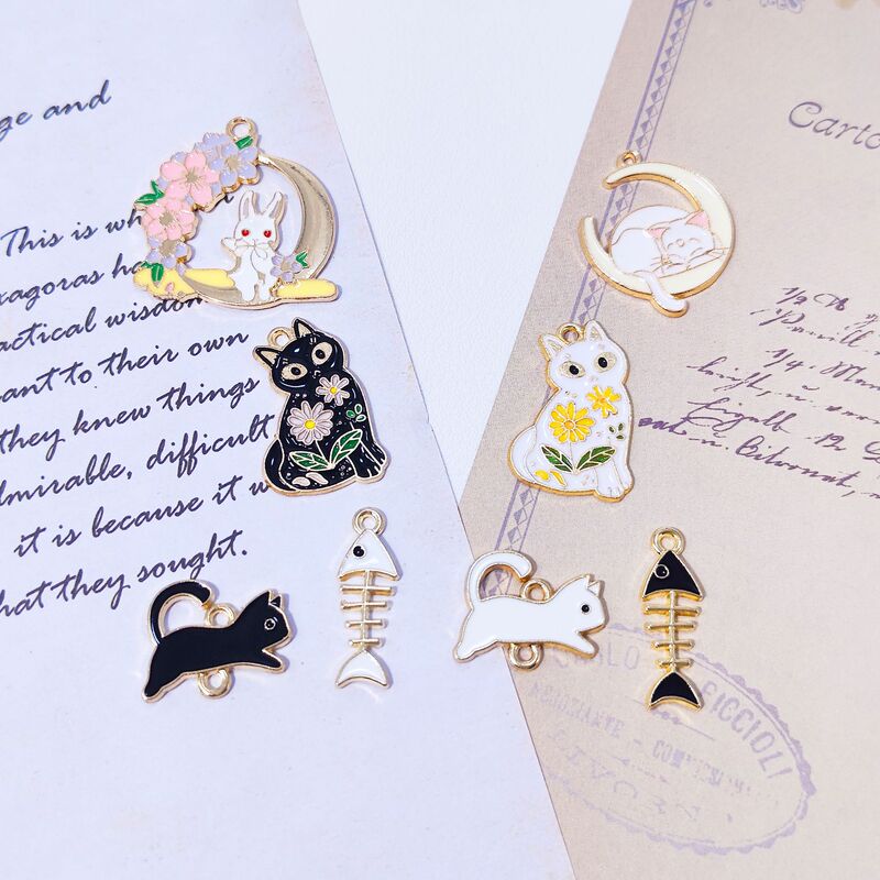 Cross-border DIY jewelry accessories Korean style k gold drop oil alloy double hanging cat fish bone cute pendant earrings material Cross-border DIY jewelry accessories Korean style k gold drop oil alloy double hanging cat fish bone cute pendant earrings material