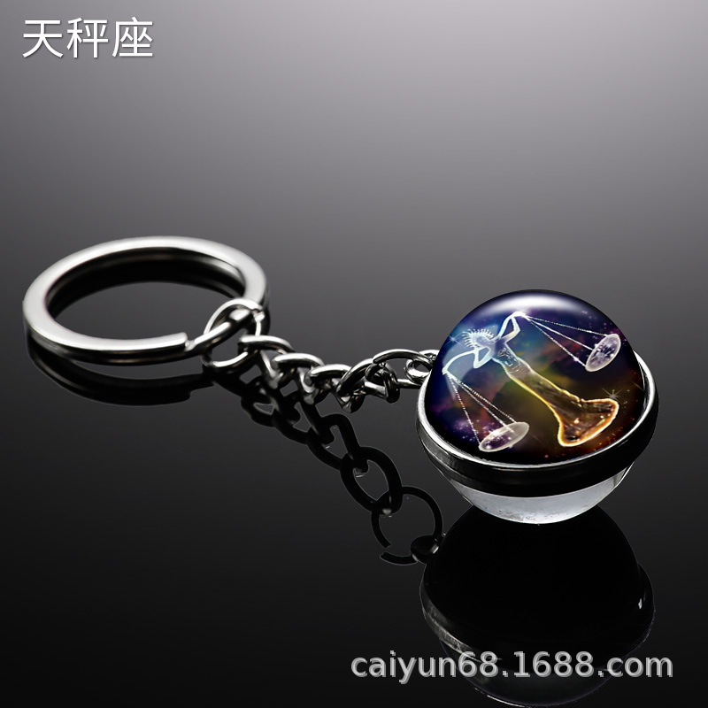 Transfronterizo 12 constelaciones de luz nocturna bolsos colgantes de bolsas de joyas de tiempo doble cara bola de vidrio llavero al por mayor