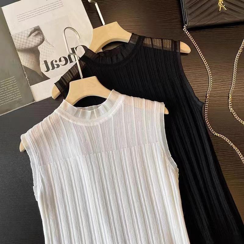 ファッションは春夏の新型の袖なしのウールのメリヤスレースに合わせて、女性のベストを身につけて痩せた純色の底のシャツを見せます。|undefined