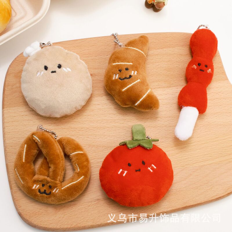 創意的な漫画の食品のぬいぐるみのペンダントの趣味は牛の角のカバンの子供の鍵を遊んでリュックサックを掛けて飾って屋台を並べて卸売りします。|undefined