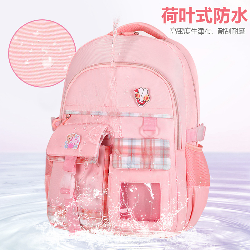 Logotipo personalizado transfronterizo de primer grado portátil desgaste fábrica de descompresión niñas niños bolsas escolares al por mayor