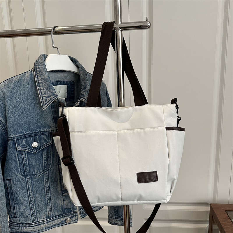 Bolso de lona coreano para mujeres nueva moda ocio de gran capacidad mochila portátil tote simple bolso de hombro para estudiantes