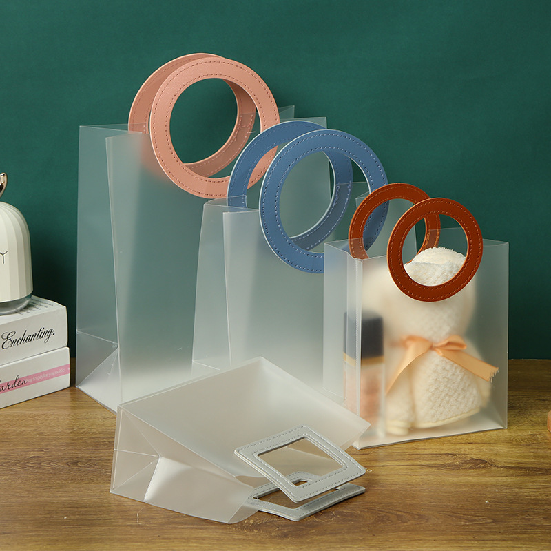 Bolsas de mano transparentes de plástico PP en stock, bolsas de regalo con alto valor estético, bolsas de regalo de alta gama con un tacto premium, portátiles. image 6