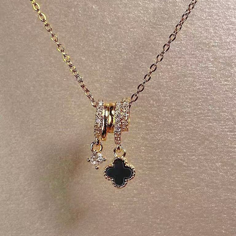 Cross-Border Hot Selling Four-Leaf Clover Titanium Steel Necklace Women's High-End Light Luxury Simple Versatile Micro-Encrusted Zircon Clavicle Chain Wholesale