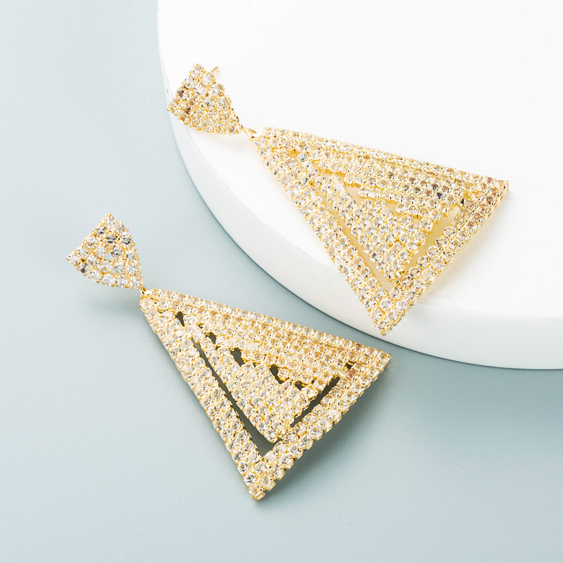 Fashion Hollow Alloy Inlaid Rhinestone Triangle Earrings Wholesale Nihaojewelry display picture 6