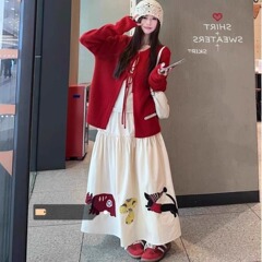 ベルトを重ねて長袖のニットのカーディガンのtシャツを着て、布の半身のスカートの女性の2025春の韓系のファッションのスーツを貼ります。