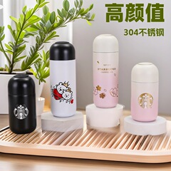 星のお父さんの星巴Kは同じタイプのかわいい男女のカップルの高い顔の値の桜の花粉の304ステンレスのカプセルの保温カップです。