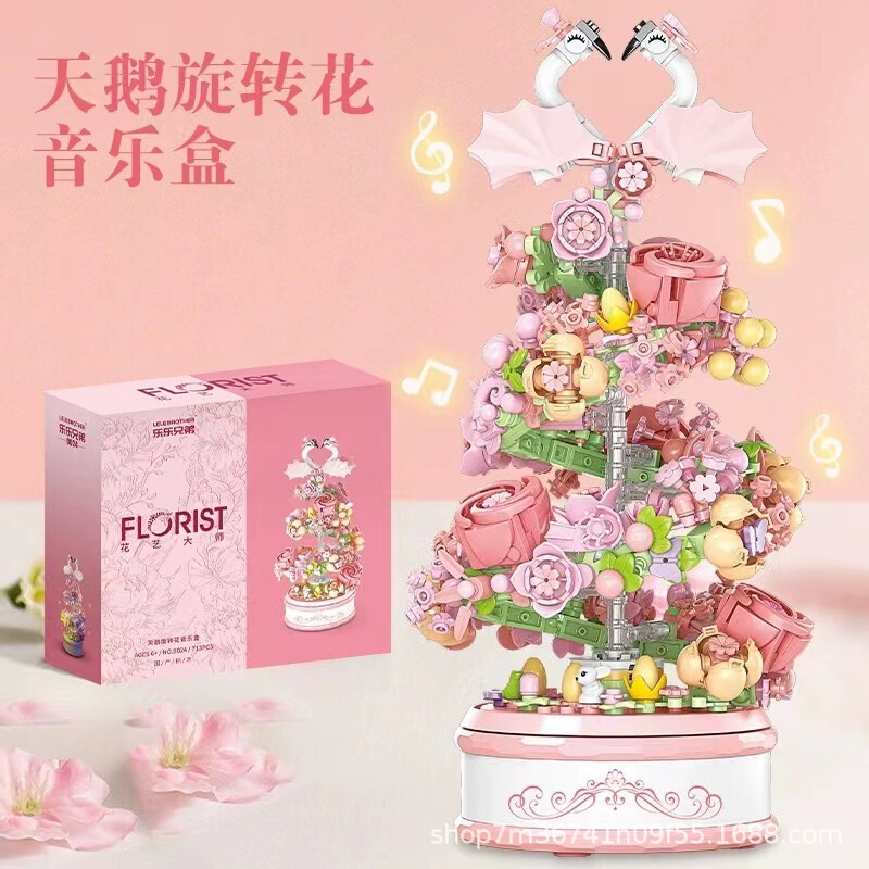 レゴの美しい照明の白鳥の滝の花の結婚式の回転のオルゴールの小さい粒子の積み木のつづり合わせのおもちゃに対応します。|undefined