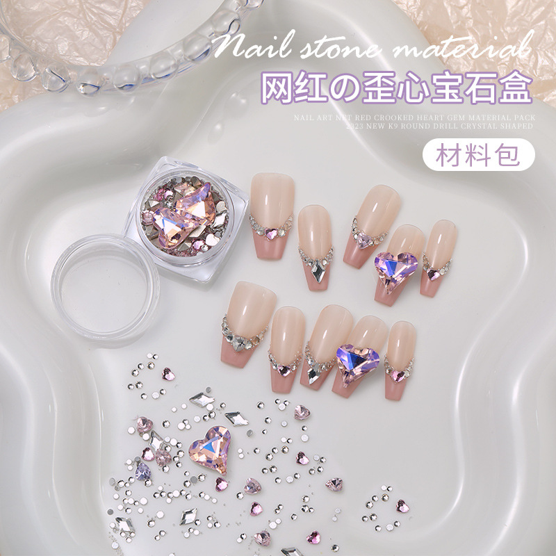 Arte de uñas celebridad en línea corazón torcido gema material paquete nuevo K9 cristal de diamante redondo tamaño especial en forma de diamante decoraciones de uñas al por mayor