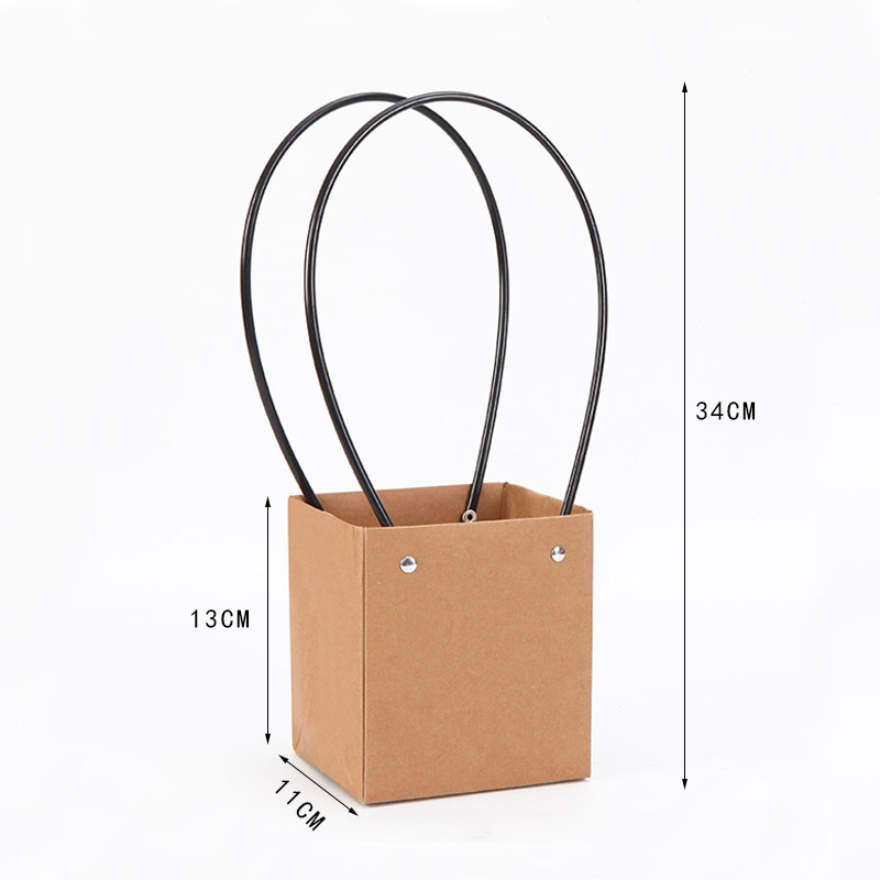 Gran cantidad y excelente precio de fábrica de ventas directas de todo tipo de película de plástico impermeable de papel Kraft bolsa de flores portátil diosa festival bolsa de ramo