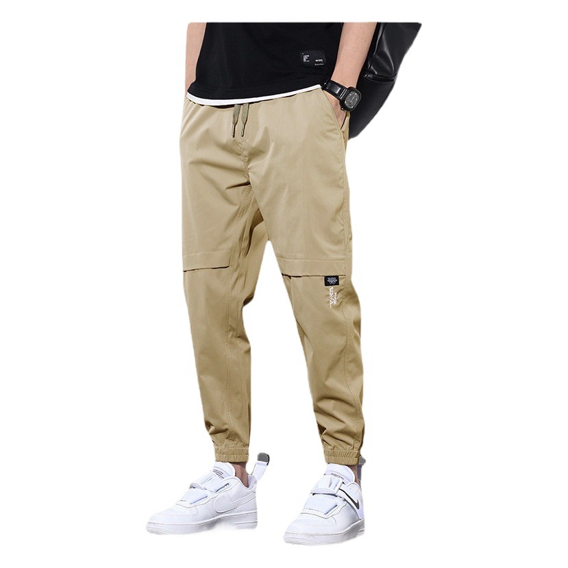 Ropa de trabajo de primavera y otoño pantalones largos pantalones casuales de los hombres pantalones sueltos atados al tobillo marca de moda de primavera y verano Pantalones deportivos delgados