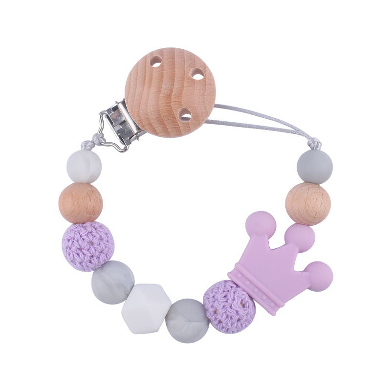 Suministros para bebés calmante clip de chupete de haya bebé anti-caída de la cadena de dibujos animados corona de silicona perlas mordedura molar chupete cadena