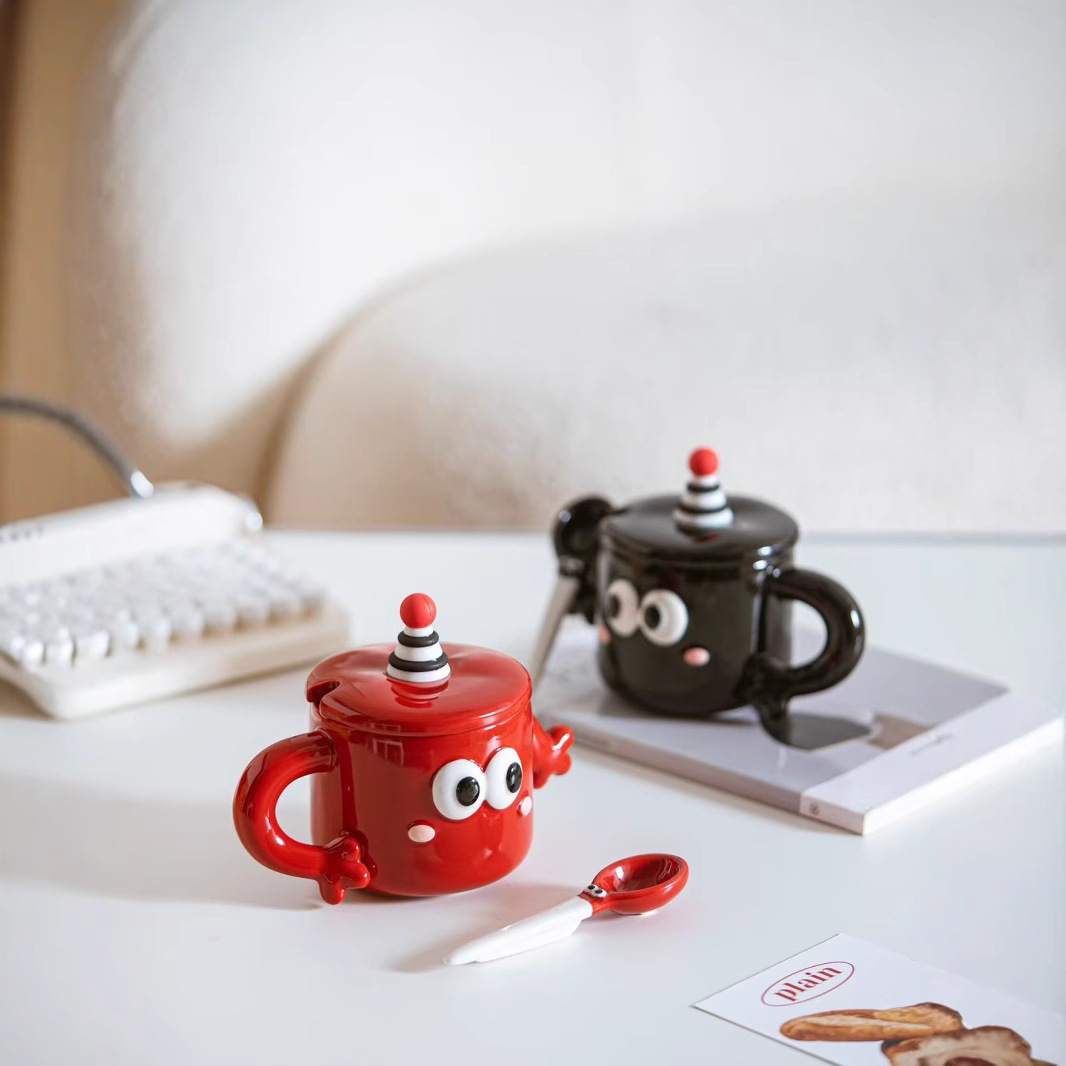 Personalidad de dibujos animados adorables ojos grandes negros y rojos copas de agua de cerámica encantadora mano a mano taza con cubierta taza de café cuchara