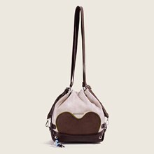 韩版休闲运动感抽绳双肩包甜酷撞色设计感复古水桶包女单肩斜挎包