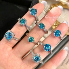 ディザトーン生放送の爆発金はモルディブの青い緑の莫桑のダイヤモンドの指輪をまねます。