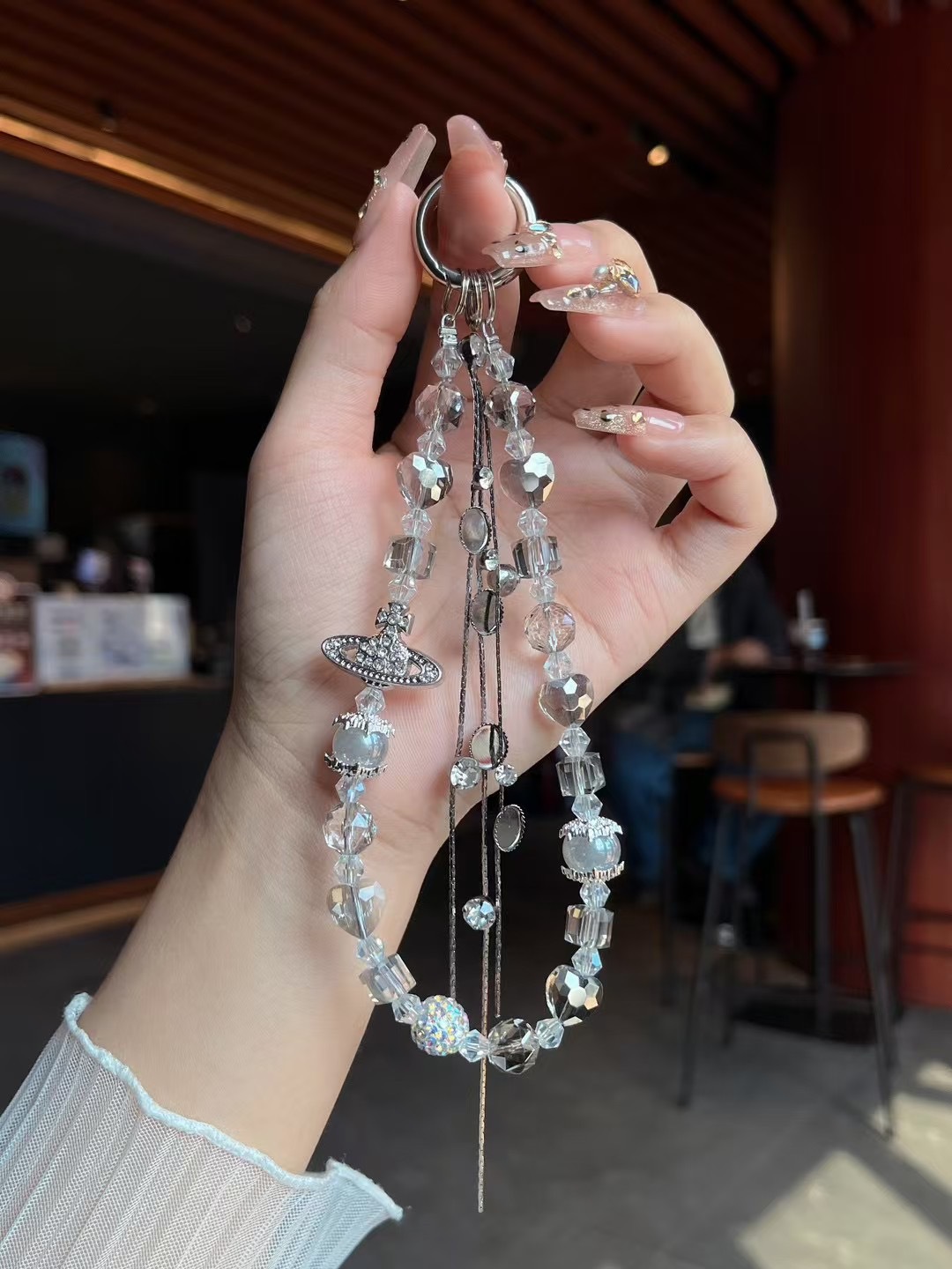 Cable de teléfono móvil de alto nivel, la emperatriz imperial del oeste Saturno, el planeta, cuentas de cristal, cuentas de fresa, cadenas de teléfono móvil hechas a mano, colgantes de muñeca