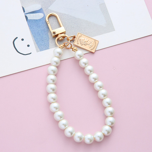 Retro trendy brand pearl key chain wholesale antique simple small pendant alloy key chain mobile phone chain bag pendant