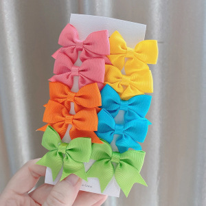 Juego de horquillas con lazo de cola de milano para niños de estilo caliente de Amazon, lindo y versátil, horquilla diaria para niñas europeas y americanas 323