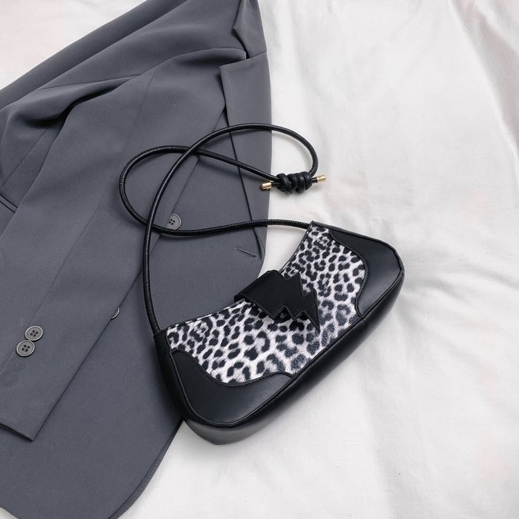 Diseño original bolso de brazo de mujer nueva textura mochila de hombro bolsa de moda personalidad media luna