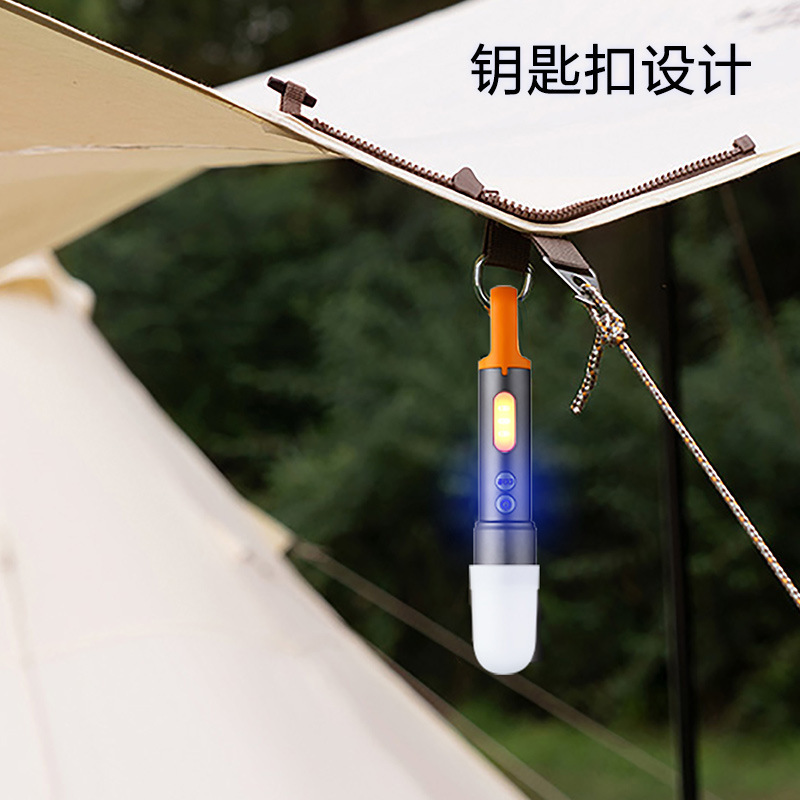 Cruz-frontera nueva linterna láser blanco al aire libre multi-función de camping luz fuerte luz de camping iluminación camping luz de trabajo