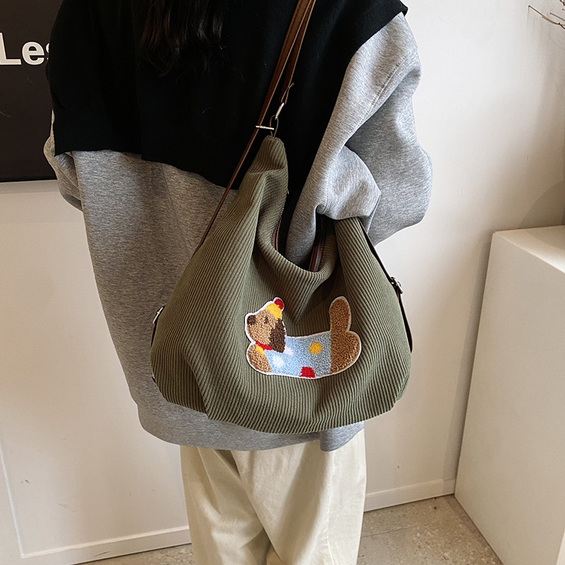 Mochila de hombro de moda exterior mochila de ocio nicho de diseño diario de viaje bolsa de cubo de moda mochila de mujer