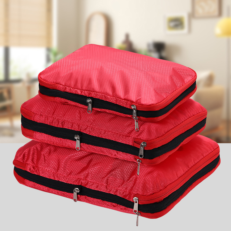Bolsa de almacenamiento de compresión de viaje explosiva de Amazon Bolsa de almacenamiento de tres piezas de gran capacidad Juego completo de bolsa de almacenamiento de ropa impermeable