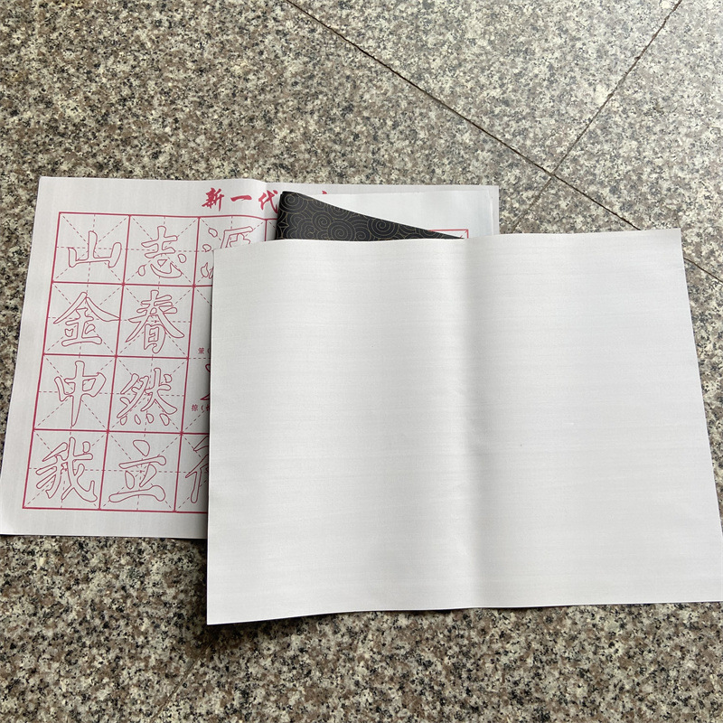 メーカーの卸売りの水写布の米の字の格の学生の初心者の基礎の書道は赤い制御のペンをなぞって入門の布を練習します。|undefined