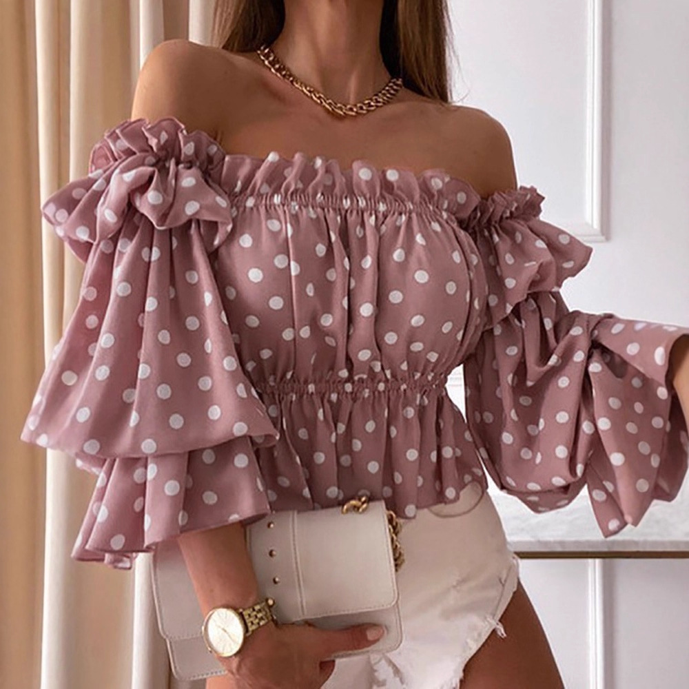Camisa plisada de un solo hombro de nueva moda europea y americana para mujer, versátil, moderna, antiarrugas, de manga corta, diseño de hombros descubiertos de estilo americano