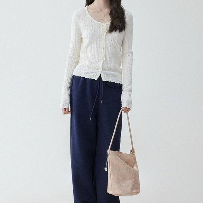 White hollow-out long-sleeve autumn knit cardigan, slim-fit, with a tie detail, short style, new design, and a light beige color White hollow-out long-sleeve autumn knit cardigan, slim-fit, with a tie detail, short style, new design, and a light beige color